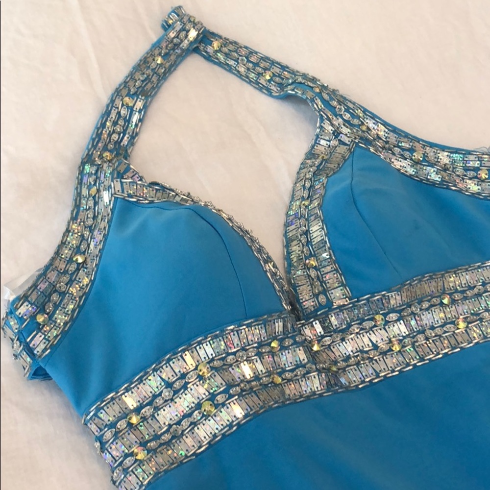 Crystal beaded blue gown.